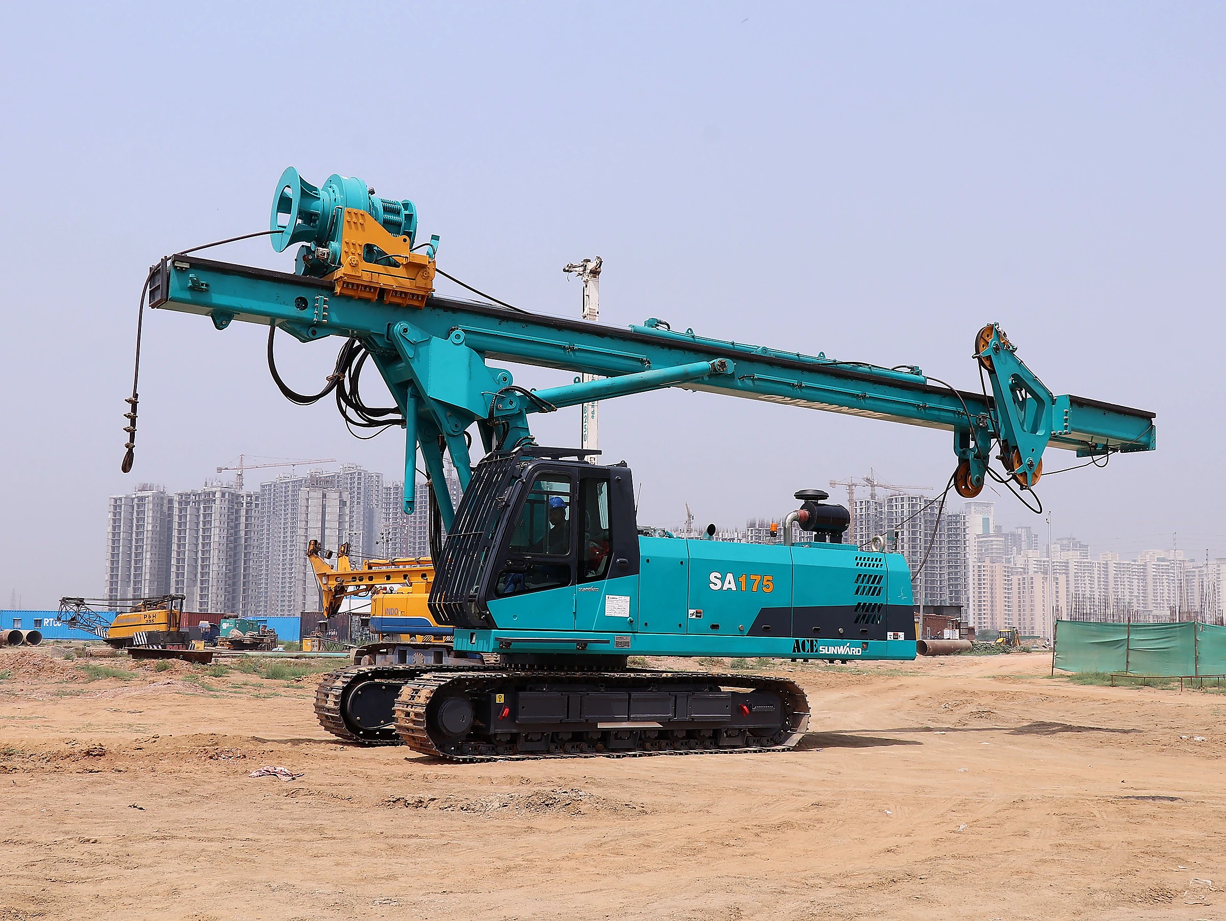 Tracked screw pile installation